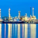 Oil refinery with the blue sky background